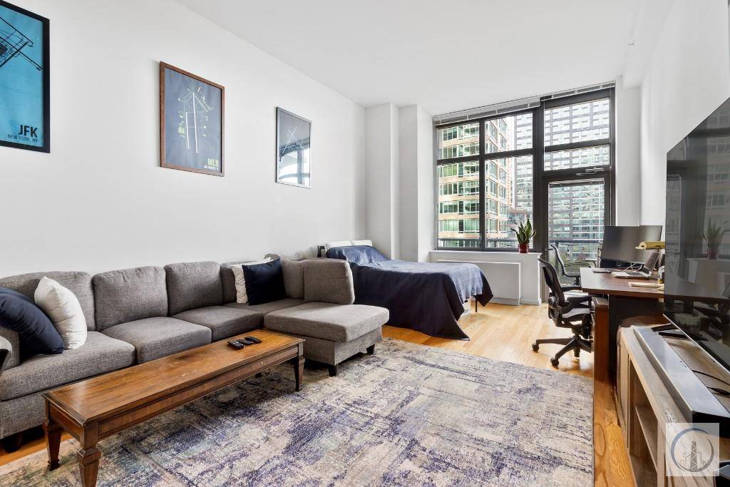 Welcome to your oasis in the heart of Long Island City, where the vibrant energy of New York City meets the tranquility of a sun drenched studio.