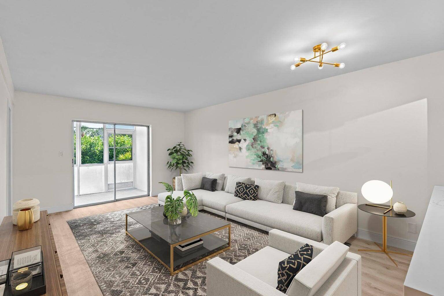 Welcome to this beautifully remodeled 2bed 1bath first floor CORNER unit in beautiful Lake Clarke Gardens.
