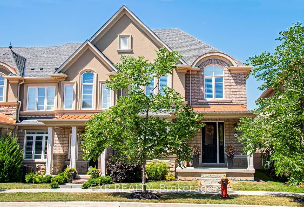 Welcome to 503 Sixteen Mile Drive, a beautifully finished end unit freehold townhome in one of Oakville's most desirable and family friendly neighbourhoods.