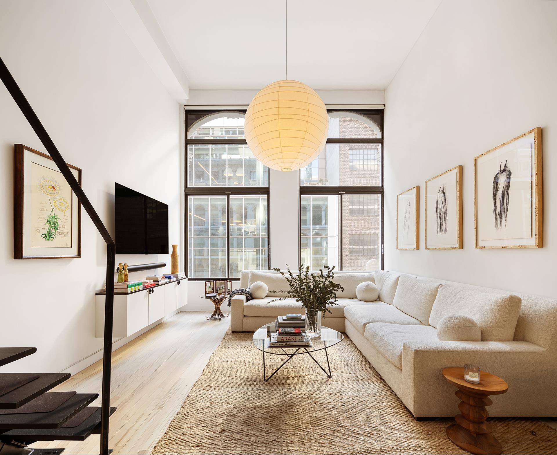 Historic charm at the Cast Iron Building Welcome to Residence 411 at 67 East 11th Street, a breathtaking loft in the heart of Greenwich Village.