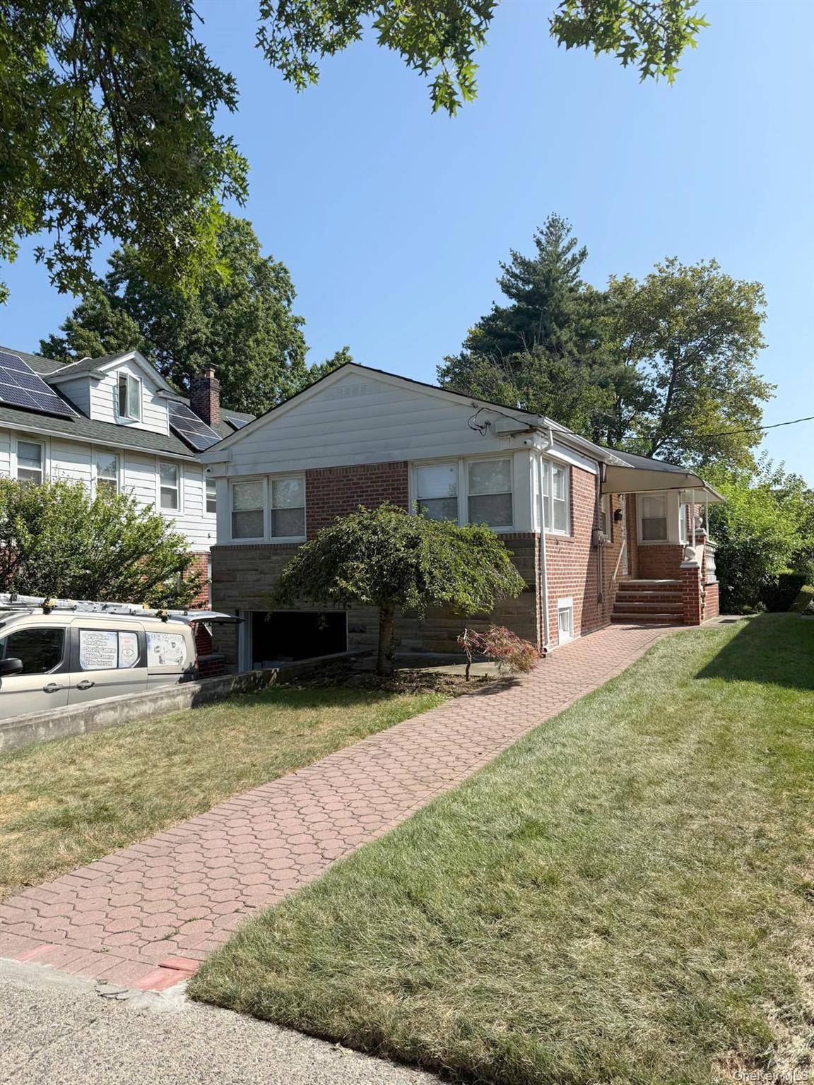Fully renovated detached house located in the heart of Jamaica Estates.