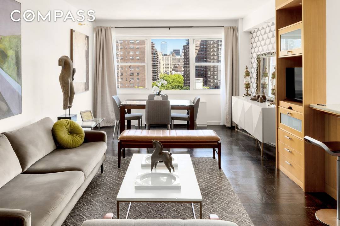 Perched 12 floors up on one of Chelsea s most coveted landmarked corners, this custom renovated two bedroom residence with the highest ceilings in the building captures some of downtown ...