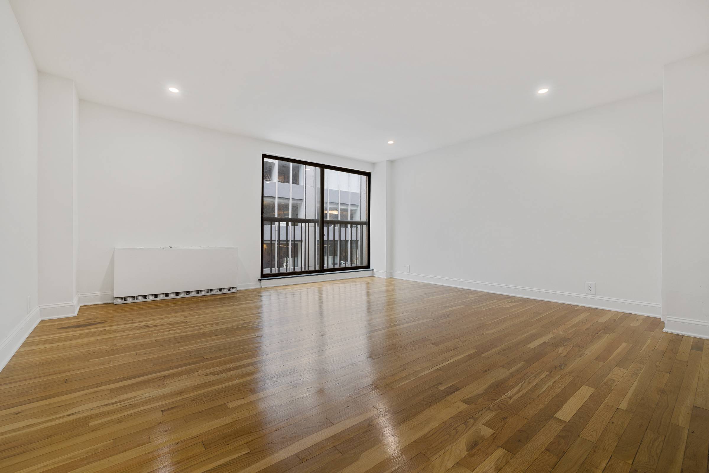 Huge loftlike duplex studio with great light and open city view.