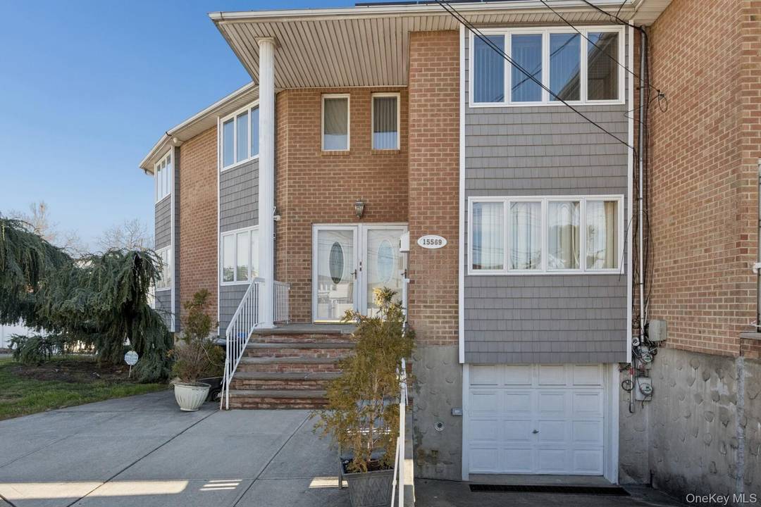 Super mint extra large brick 2 family on large lot in Old Howard.