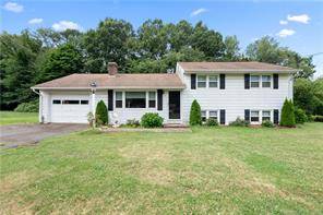 Great opportunity to own this East side 3 bedroom Split level style home situated on almost three quarters of an acre lot !