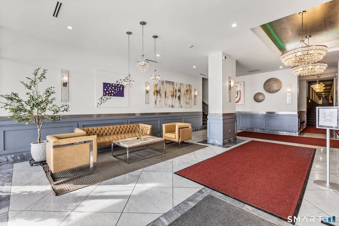 Perched on a high floor with sweeping views, this beautiful two bedroom, two bath residence is truly move in ready.