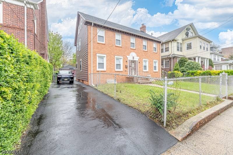 Beautifully maintained all brick Colonial in the Upper Clinton Hill section of Newark.