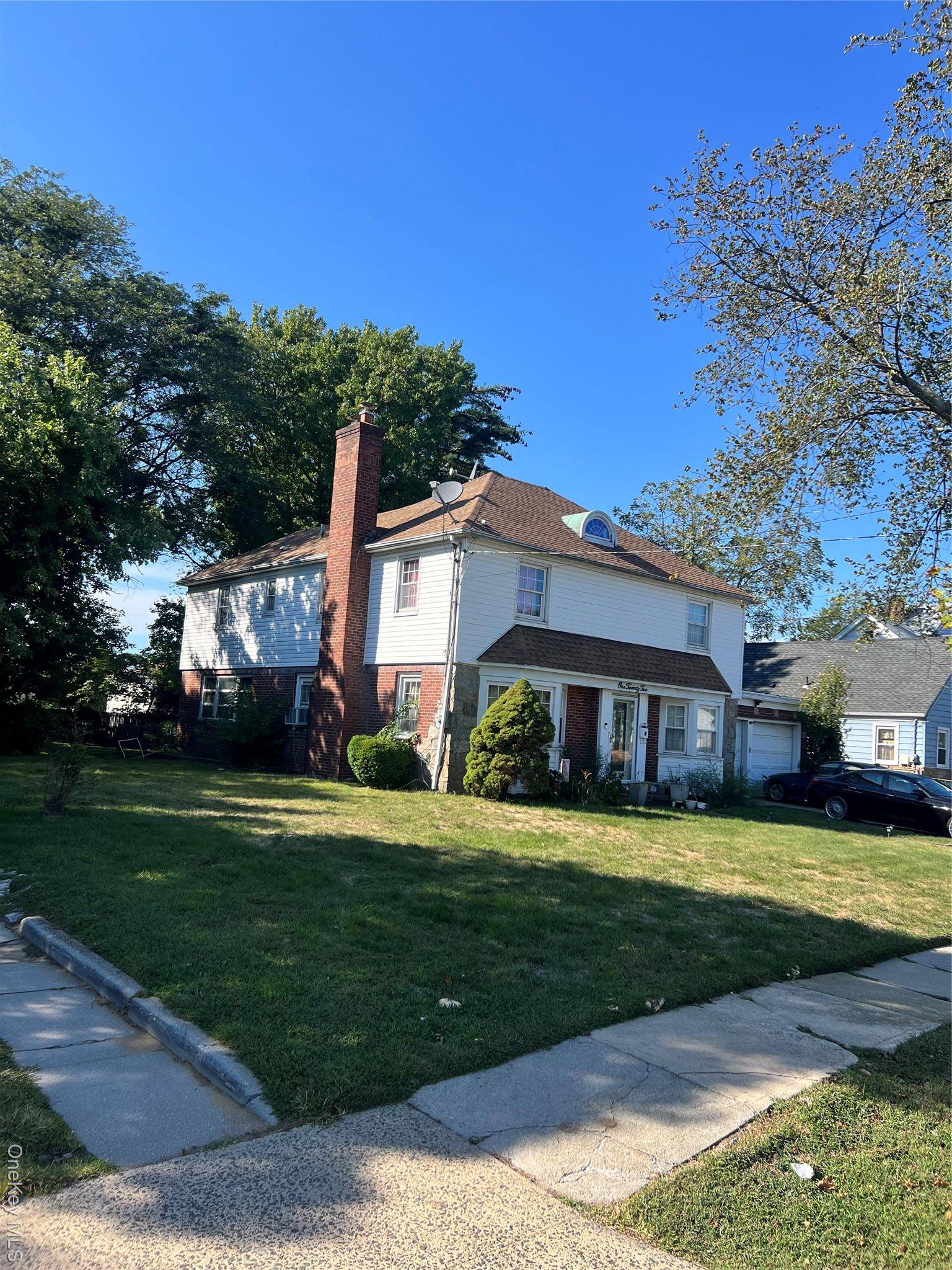 A charming colonial nestled in the heart of the beautiful Valley Stream area of Nassau Count with amazing potential for expansion on a double deeded lot boasting a frontage of ...