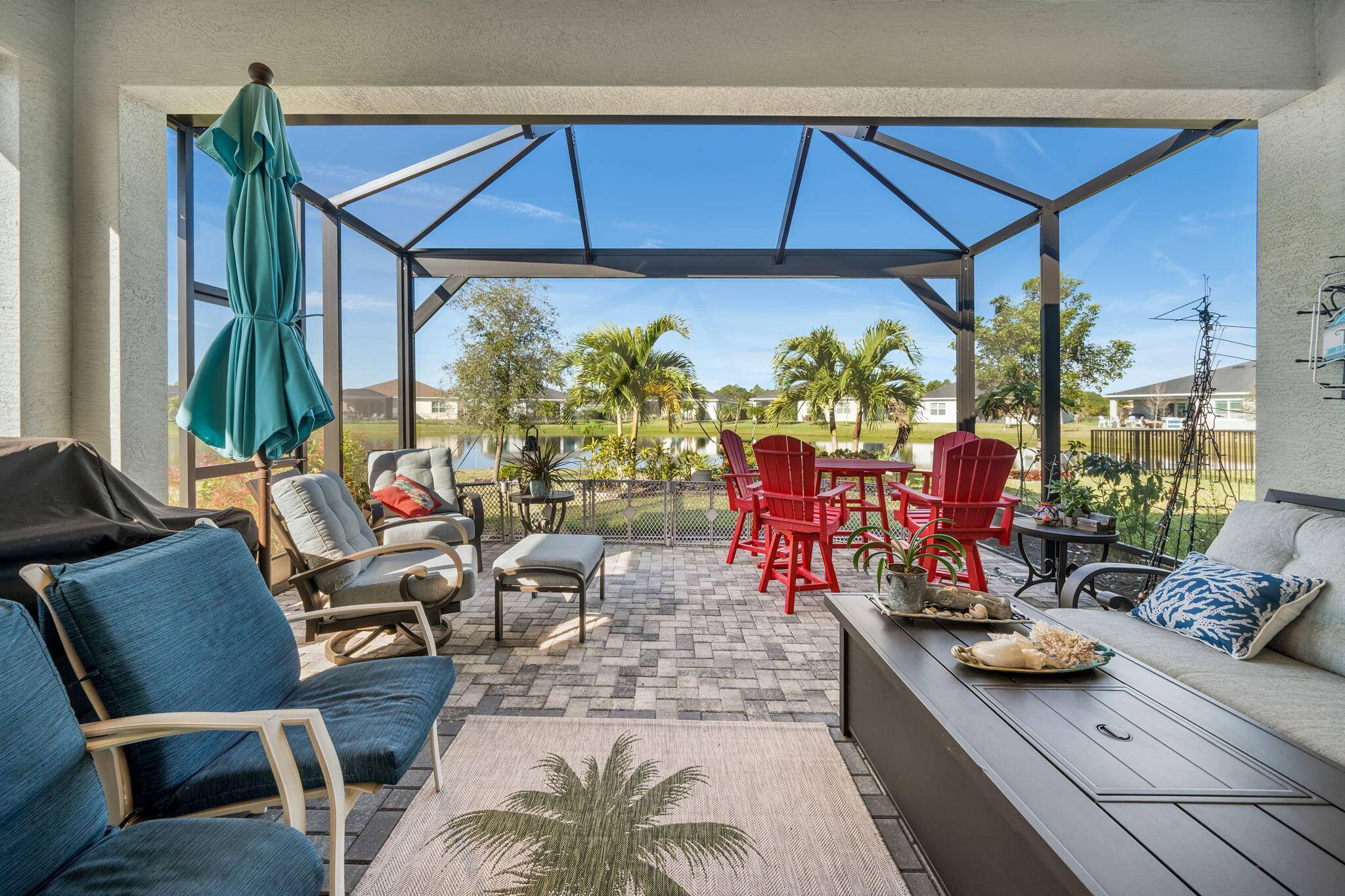 This beautifully designed 3 way split floor plan home built in 2022 features impact windows and doors, 3 bedrooms, 3 baths, AND a den, perfect for a 4th bedroom !