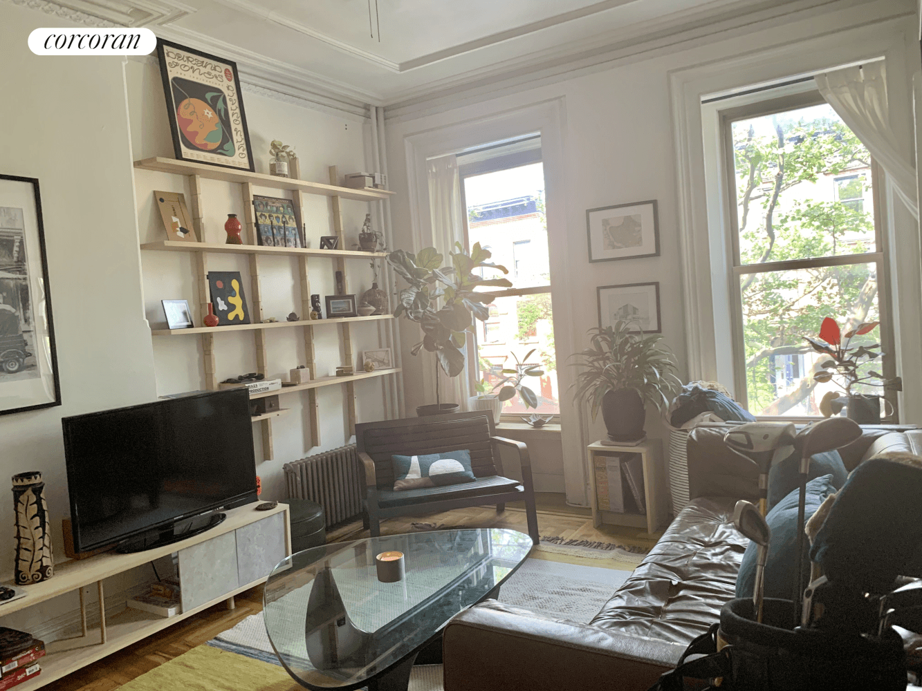 High ceilings and sunlight, vintage original mouldings and detail, modern high end appliances and custom woodwork in prime Fort Greene Clinton Hill.