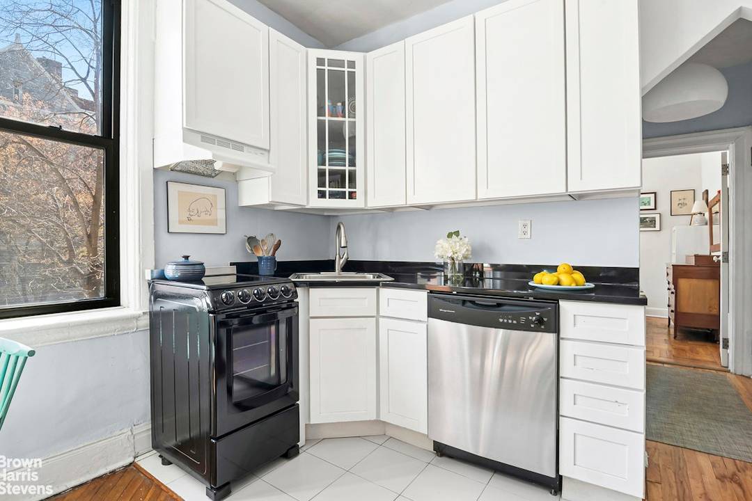Opportunity knocks ! This rarely available pre war corner apartment is nestled sweetly on a tree lined street in the heart of prime Prospect Heights.