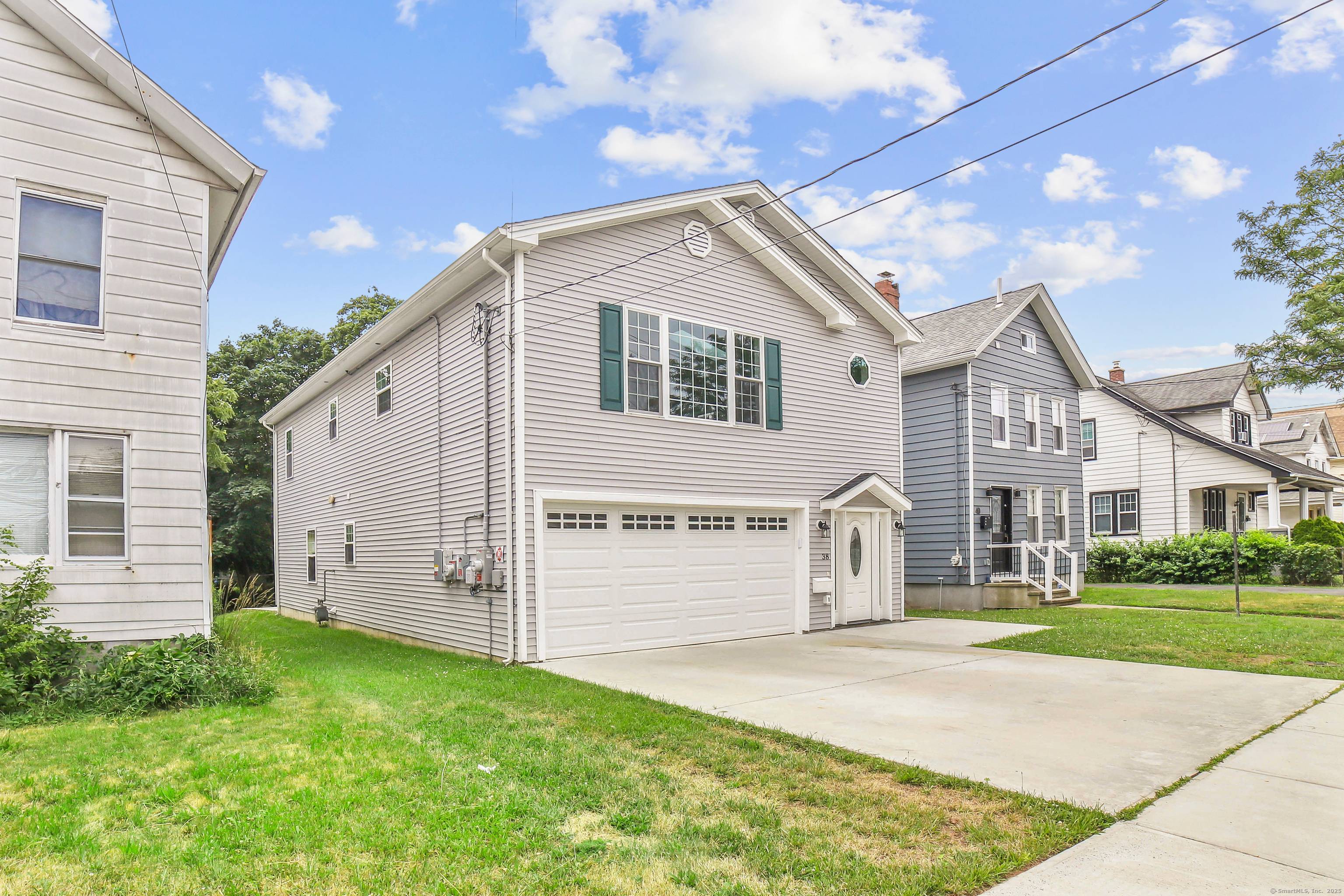 Built in 2023, this beautiful Raised Ranch with a Colonial feel offers 2, 600 square feet of living space with 5 bedrooms and 3 full baths.
