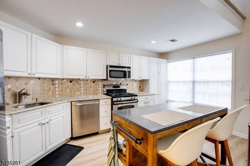 Exceptional 3 bedroom 3 full remodeled baths nestled in presitgious Moore Estates.