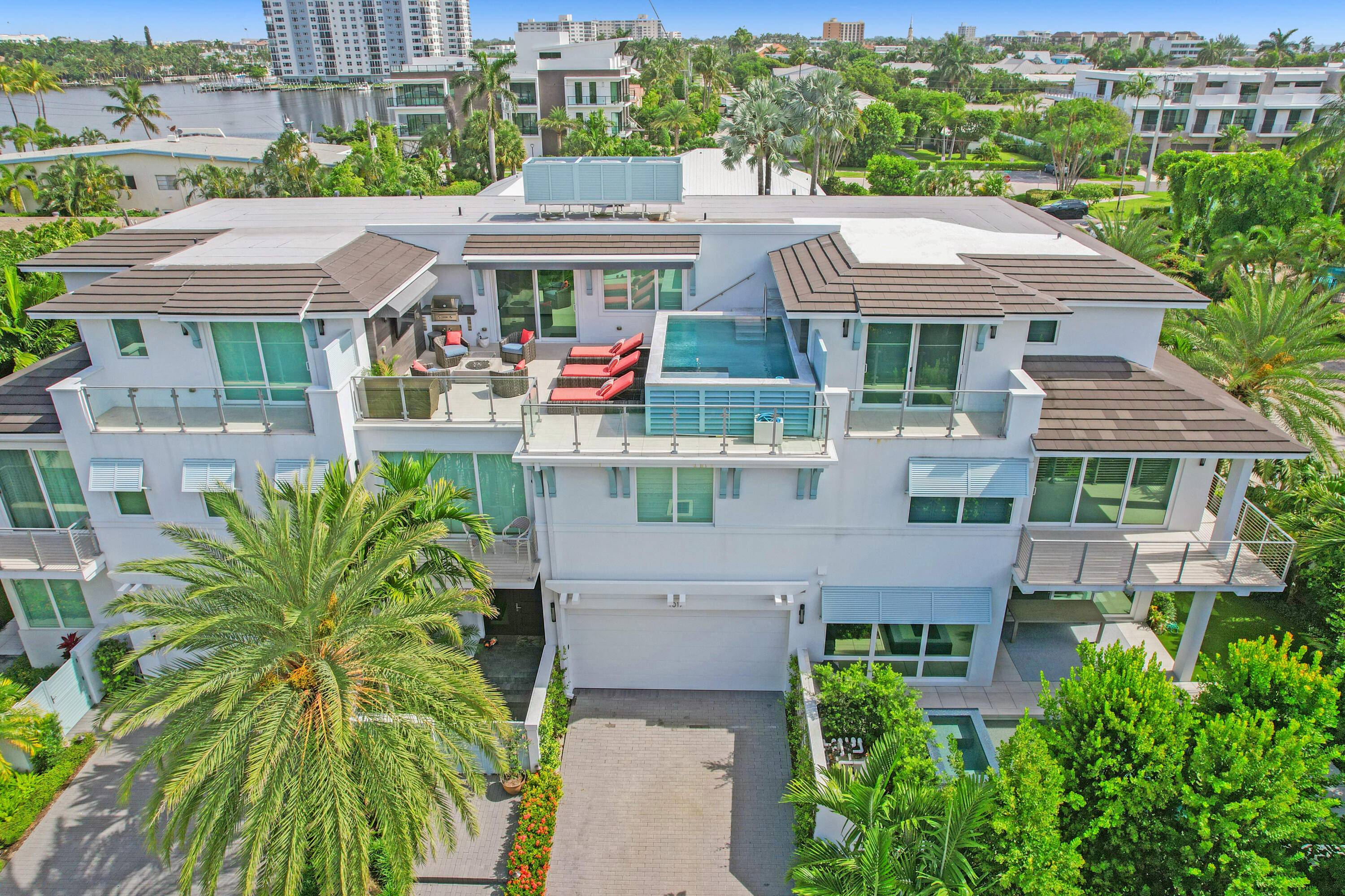 Stunning turn key, contemporary townhouse in the heart of Delray's sought after Seagate neighborhood.