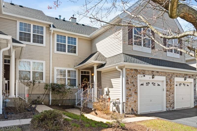 Welcome to 8 Scarlet Oak Drive in Princeton, where thoughtful updates meet true move in ready living.