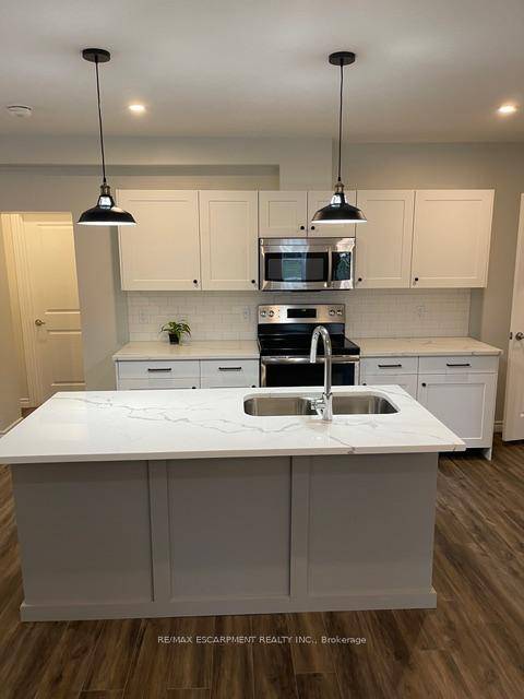 Recently renovated, 2 bedroom 2 bathroom, open concept, purpose built unit offers luxury finishing on the main floor of a duplex house.