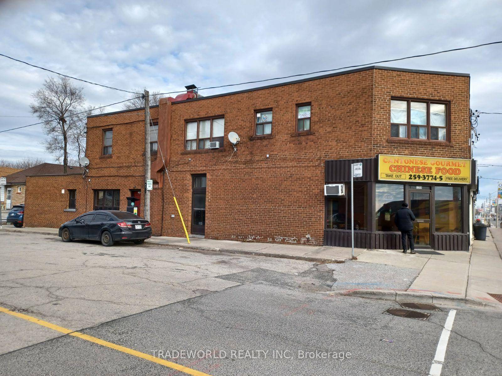 Corner Commercial amp ; Residential Building With 4 Apartment.