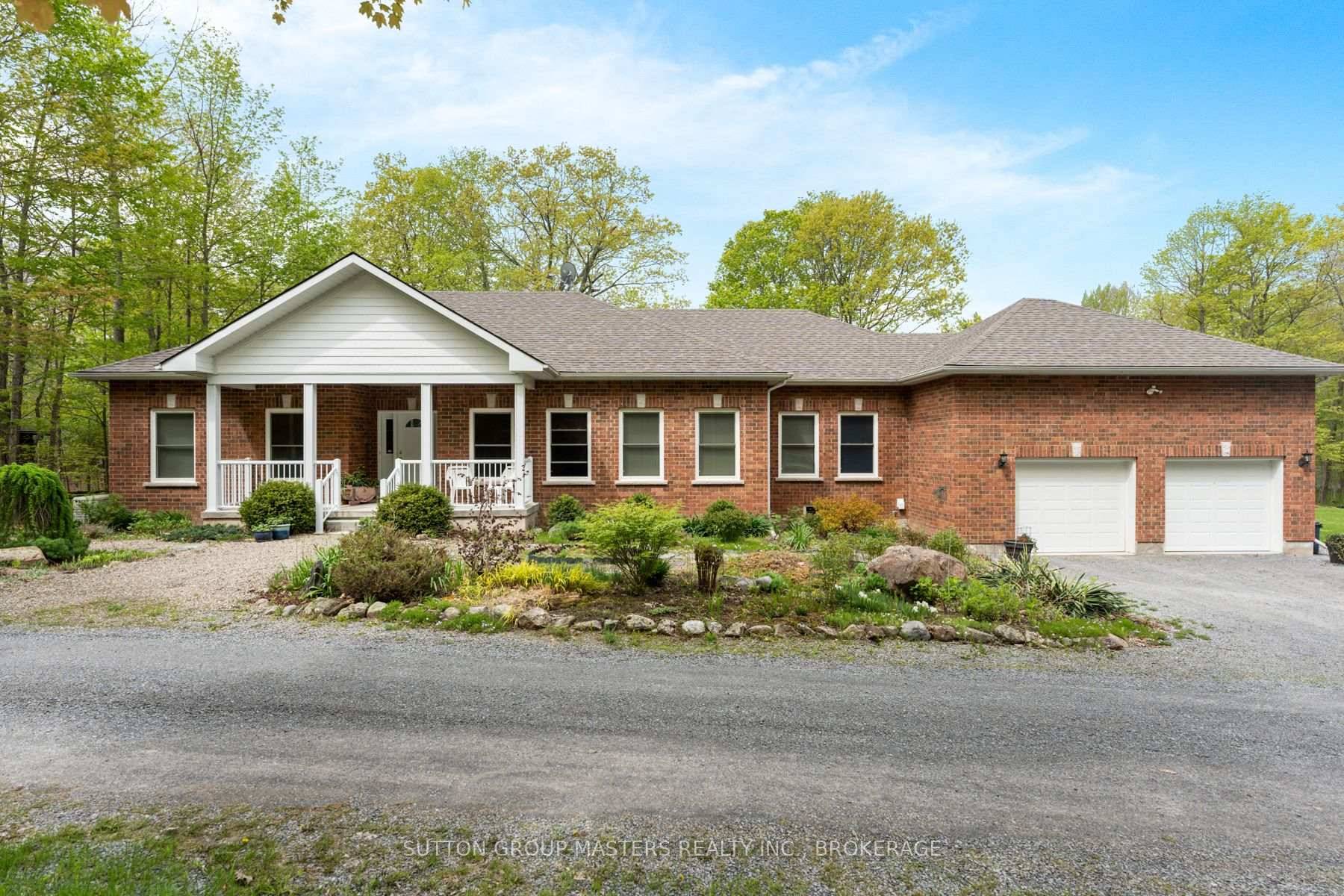 Discover refined lakeside living in this beautifully crafted, custom built home on tranquil Gould Lake, one of Sydenham's most desirable and private waterfront locations.