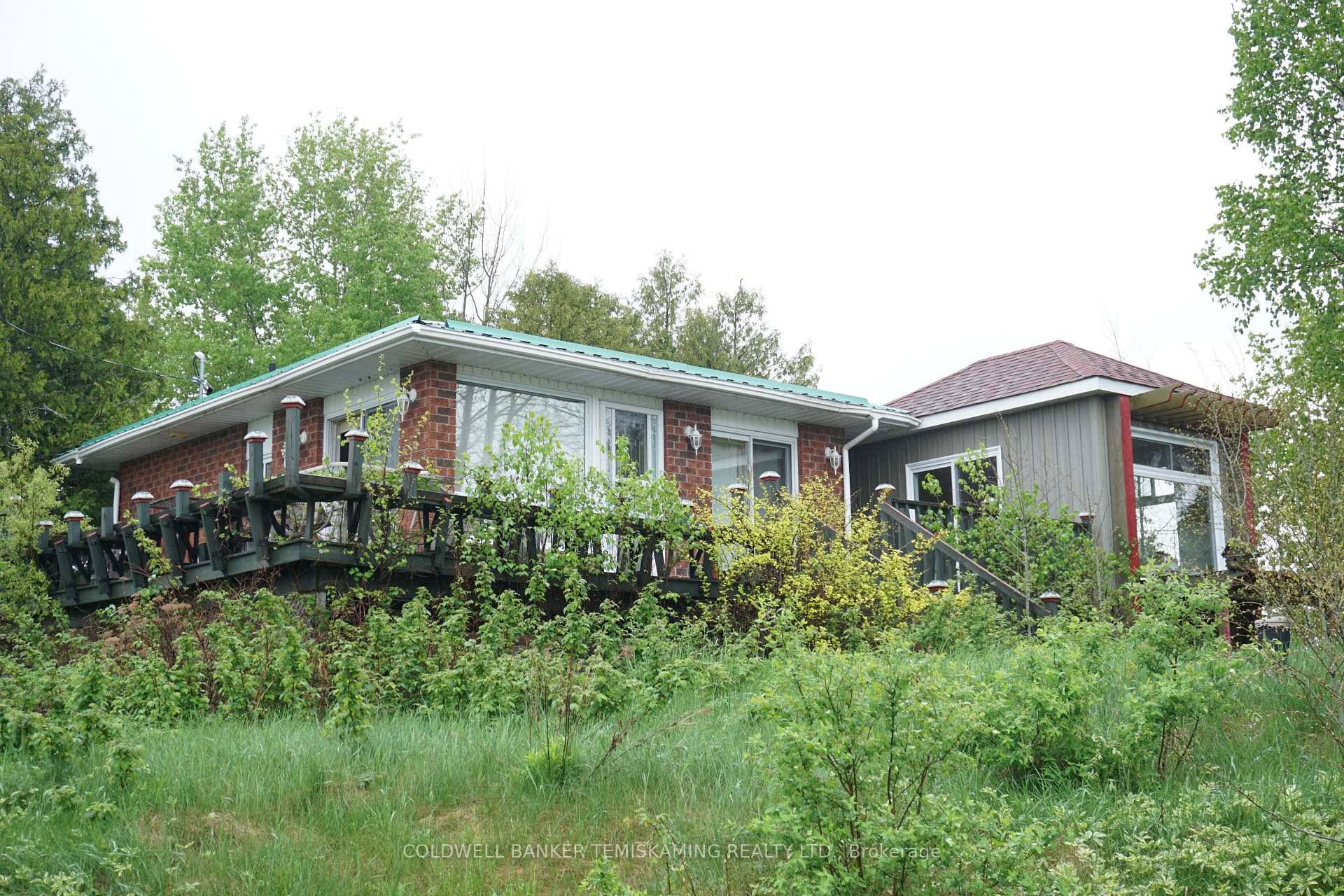MODERN 1 1 BRICK BUNGALOW WITH FINISHED BASEMENT AND WALKOUT.
