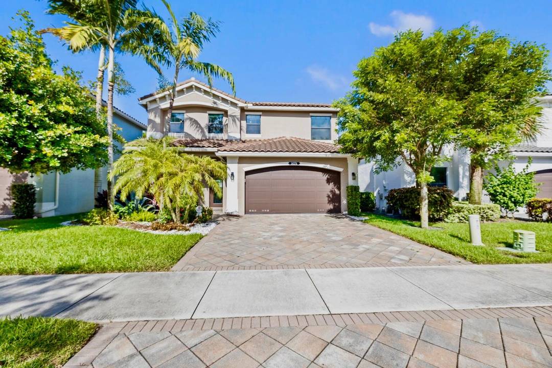 This beautiful two story single family home is located in the highly desirable gated community of Tuscany in Delray Beach.