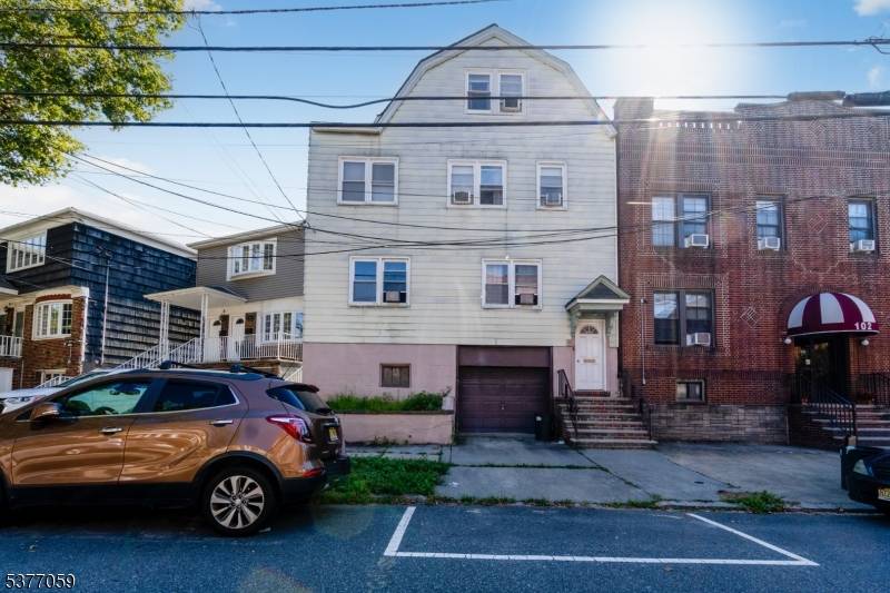 Welcome to this spacious two family home in the heart of Bayonne, offering a fantastic opportunity for both Owner occupants and investors.