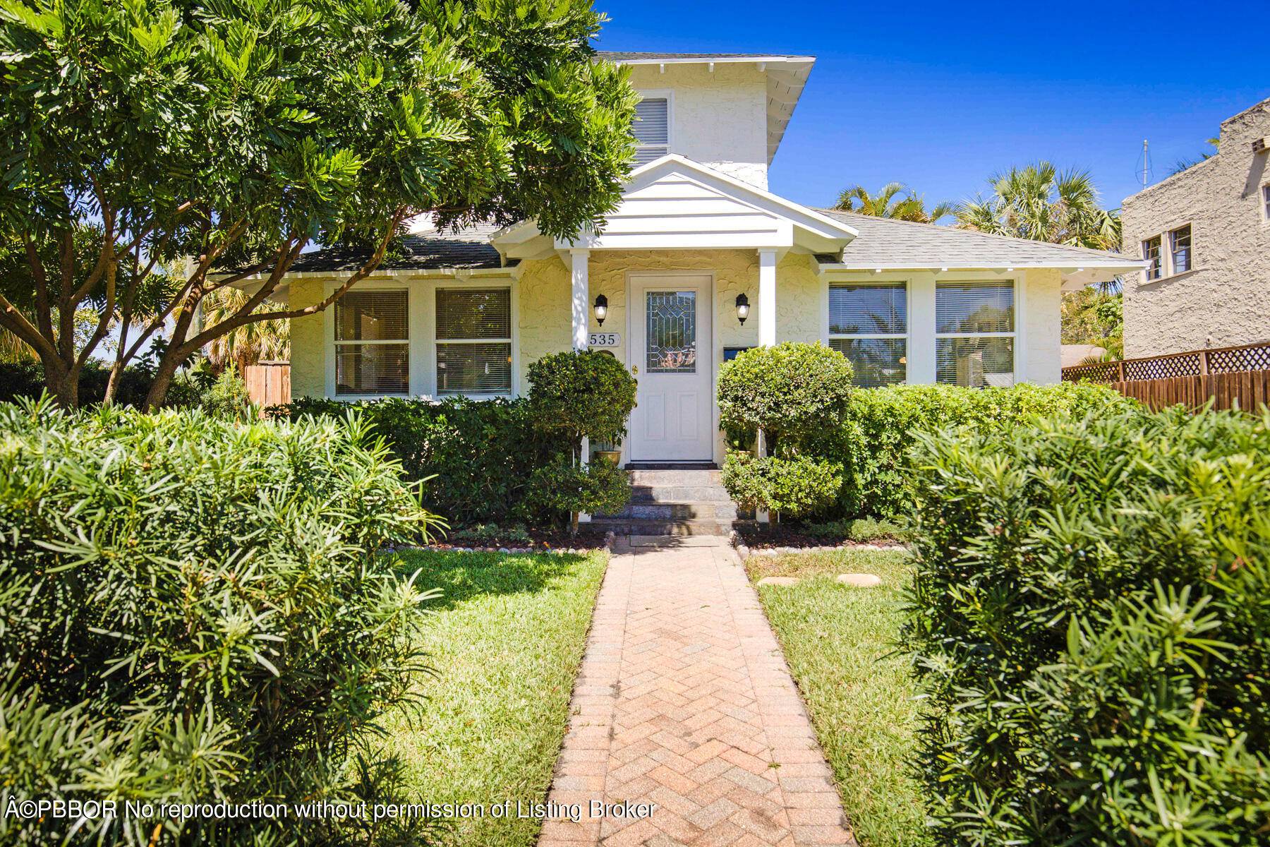 Classic bright two story Mediterranean home in charming historic old Northwood.