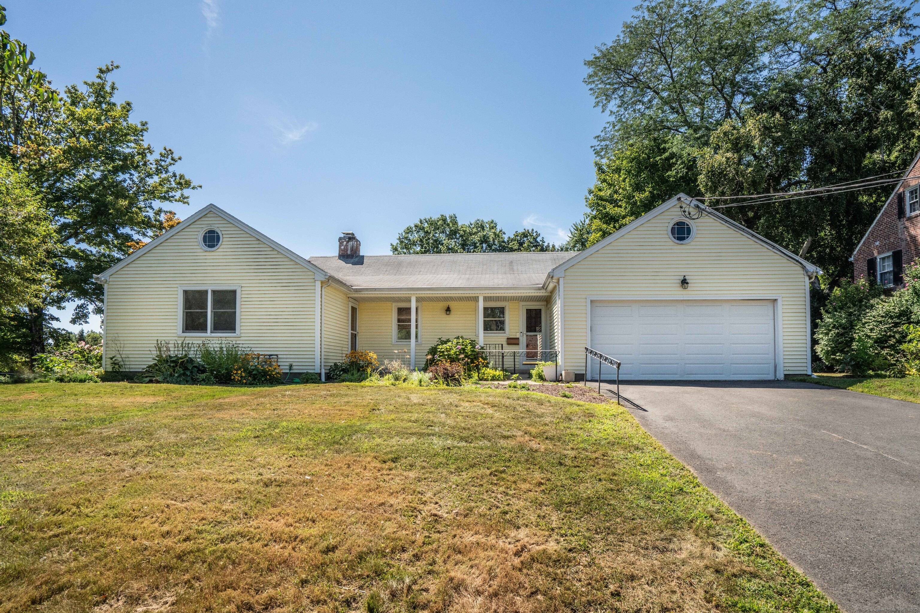 This fantastic ranch is just half a mile from all the West Hartford Center has to offer !