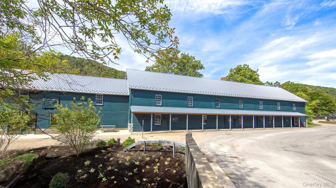 Nestled in the heart of Wassaic Hamlet on Main Street, this meticulously revitalized 1920s two story barn, spanning 10, 640 SF, stands as a testament to craftsmanship and vision.