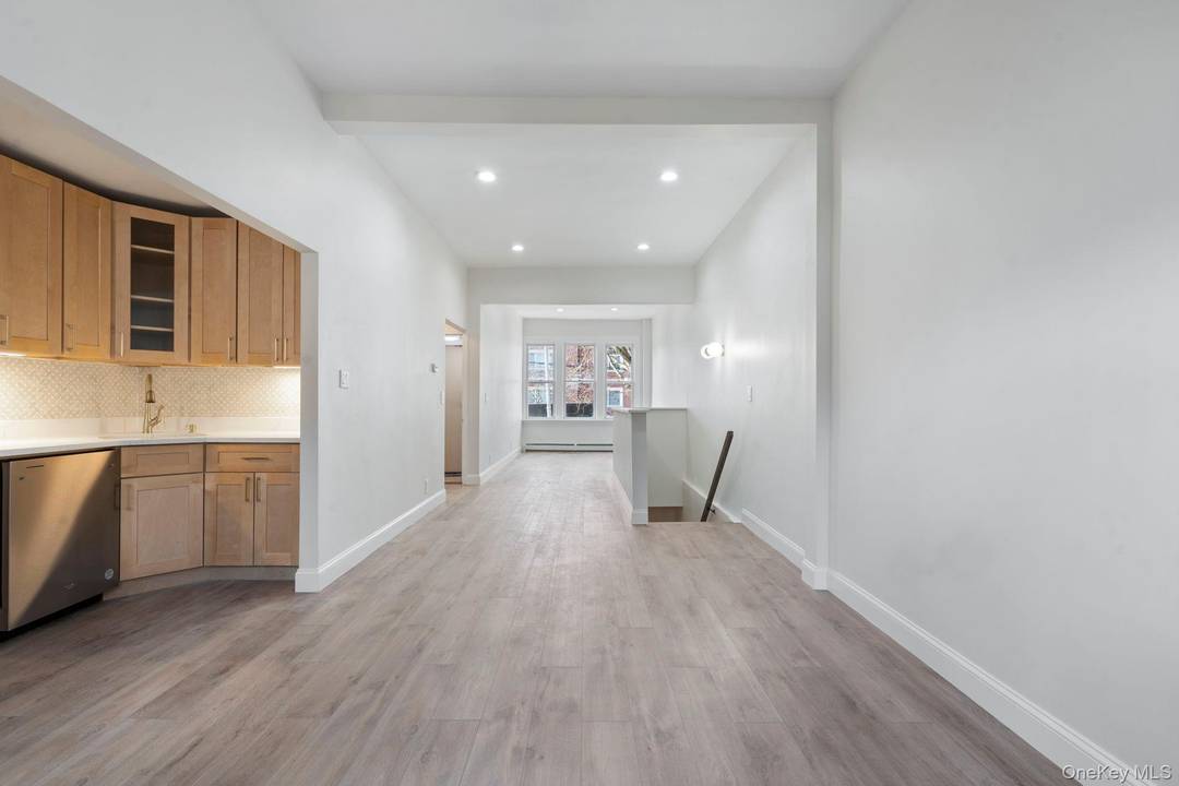 Welcome to a beautifully updated two bedroom, two bathroom townhouse style duplex offering the perfect balance of comfort and convenience in the heart of Bayside.