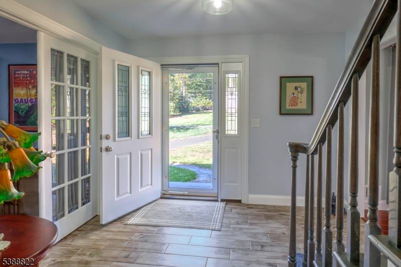 Move in Ready ! A beautifully maintained Colonial nestled on a serene 1.