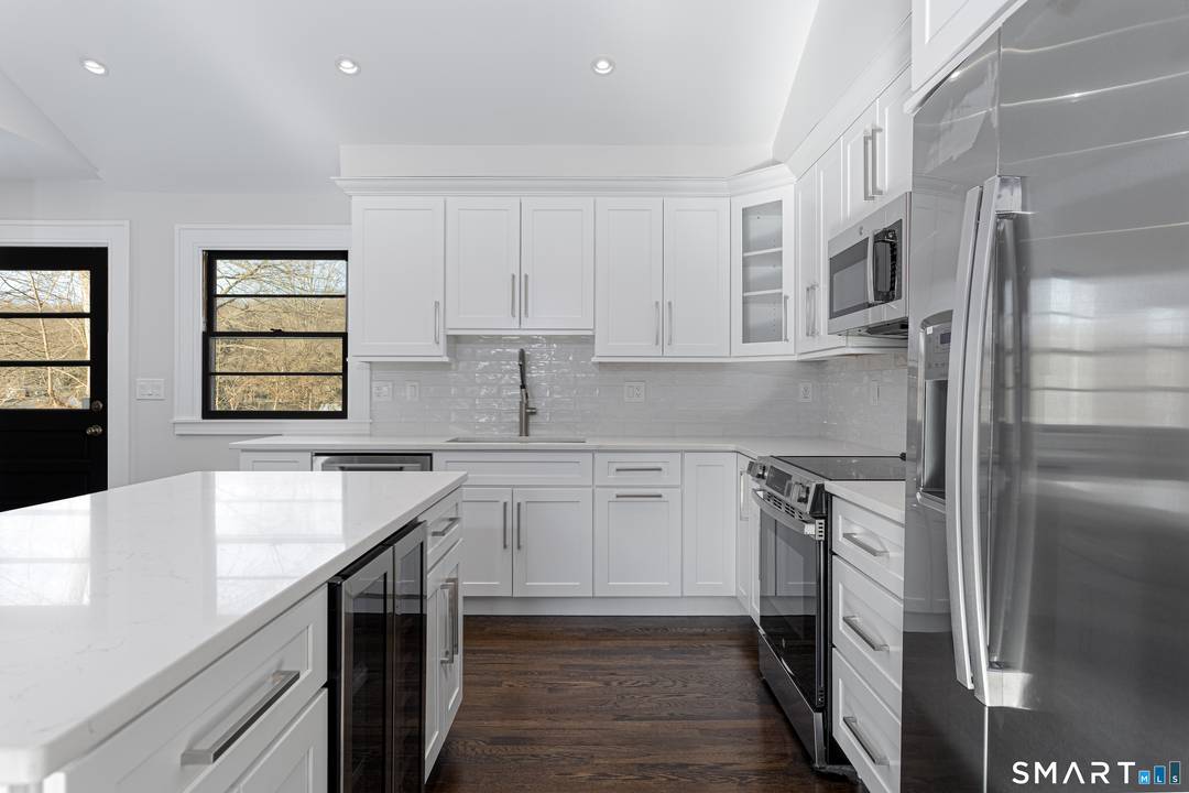 Completely reimagined from the studs up, this fully renovated 5 bedroom, 4.