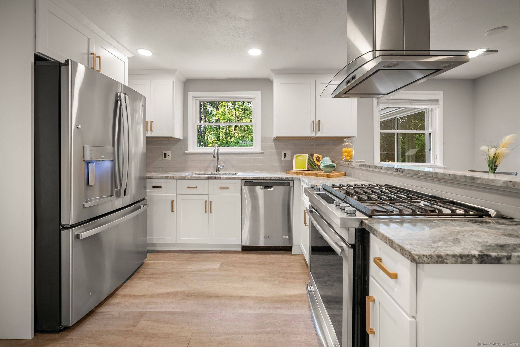 Welcome to 8 Tanglewood Road, a beautifully updated home in sought after West Hartford.