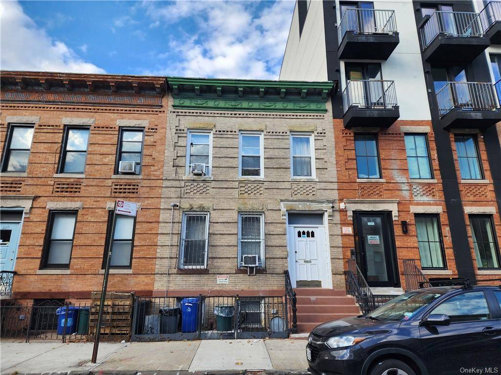 This 2 family brick townhouse in Williamsburg, Brooklyn, offers a blend of comfort and convenience.