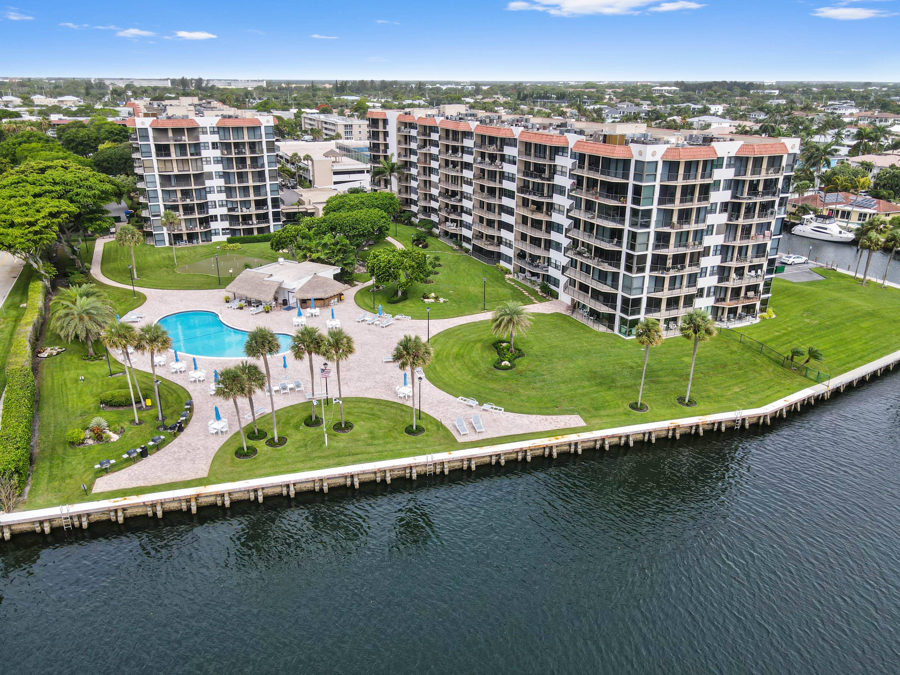 Step into luxury with this fully renovated two bedroom, two bath condo, boasting a sleek, modern kitchen featuring quartz countertops, stainless steel appliances, and chic, custom designed lighting.