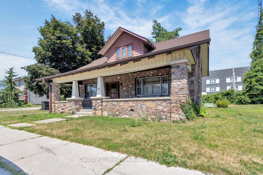 This 4 bedroom, 2 bath home in the heart of downtown Tillsonburg is bursting with character and charm !
