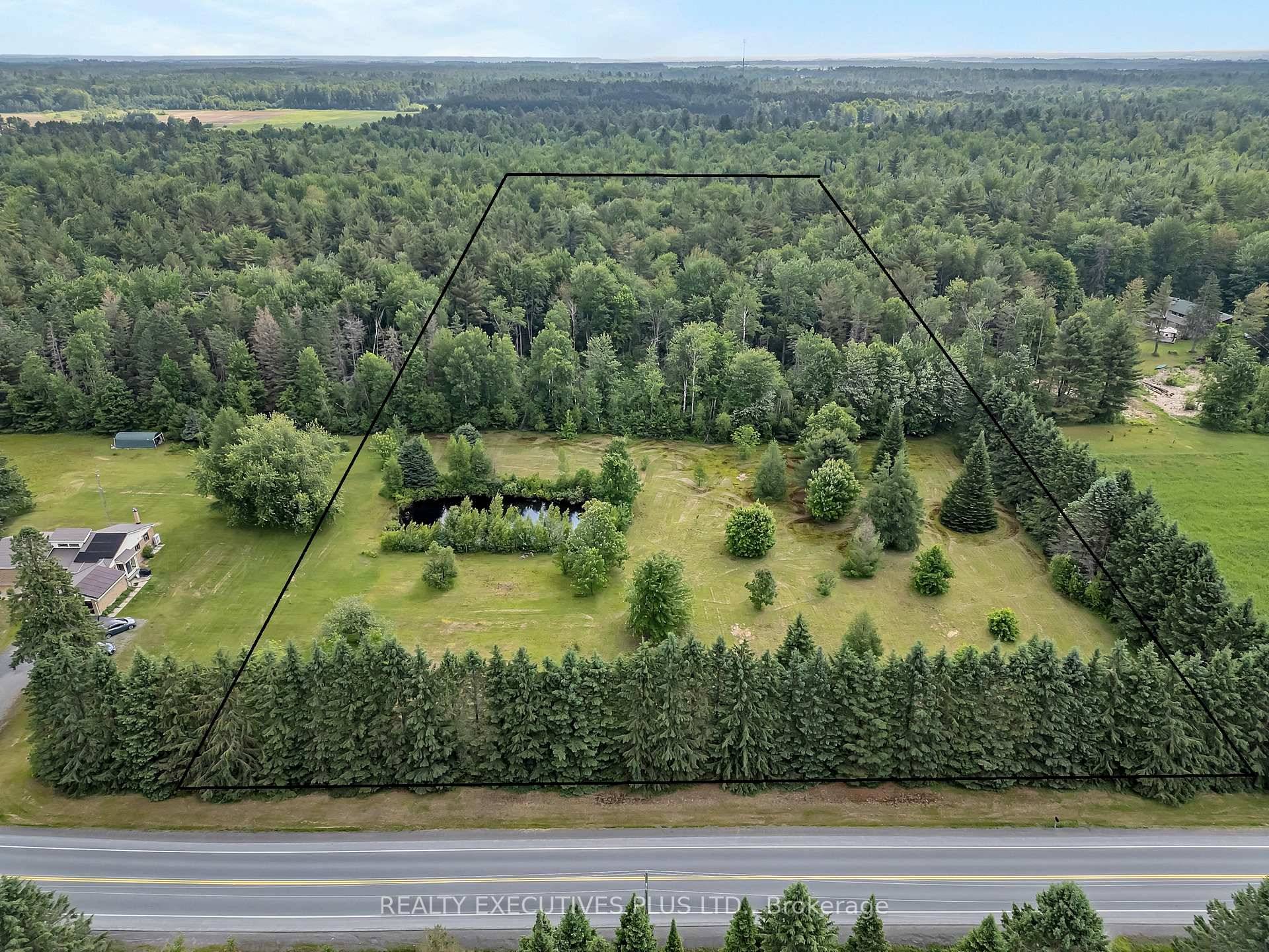 Discover the perfect blend of open space and natural beauty with this 8.
