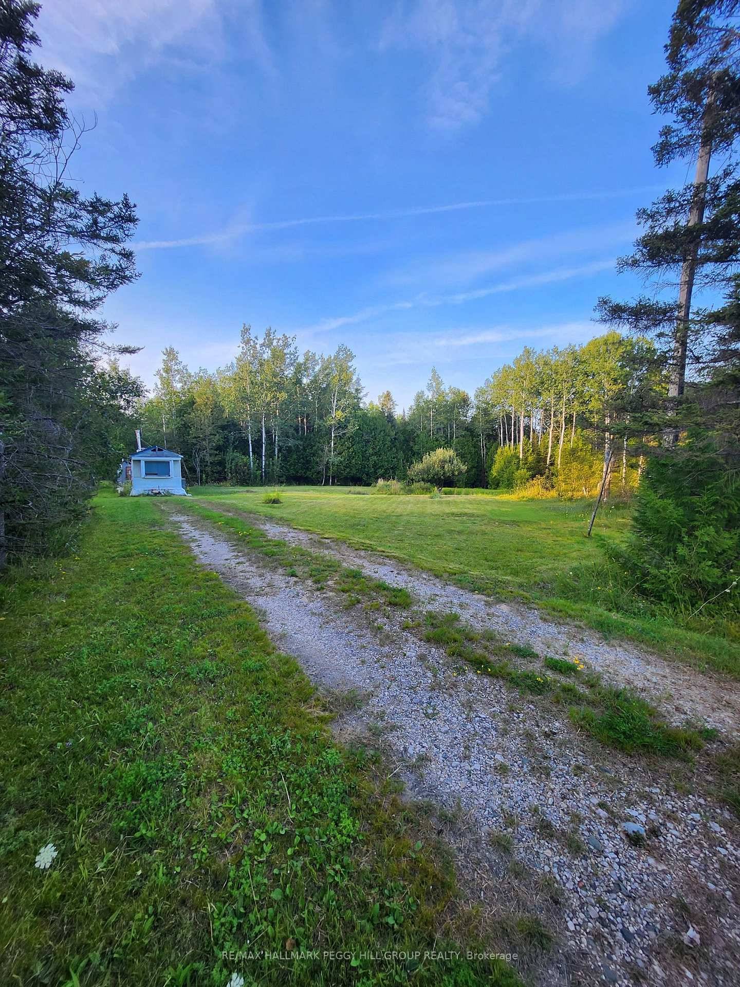 EXPLORE MANITOULIN MAGIC ON OVER 95 ACRES OF RU ZONED LAND !