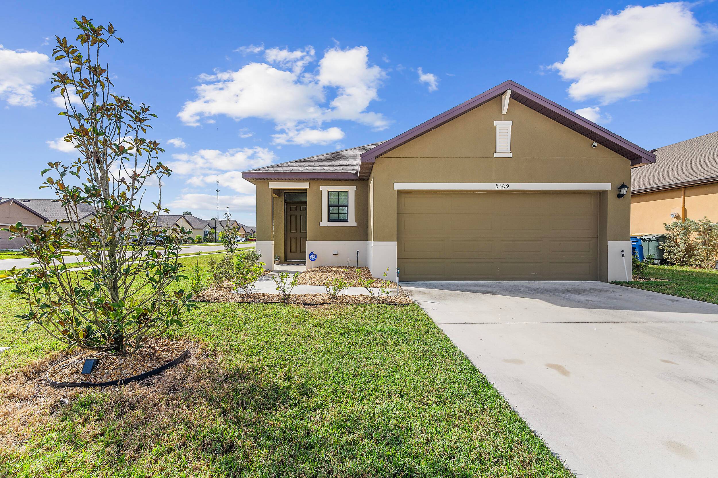 Come check it out, beautiful CBS home on corner lot w screened patio !