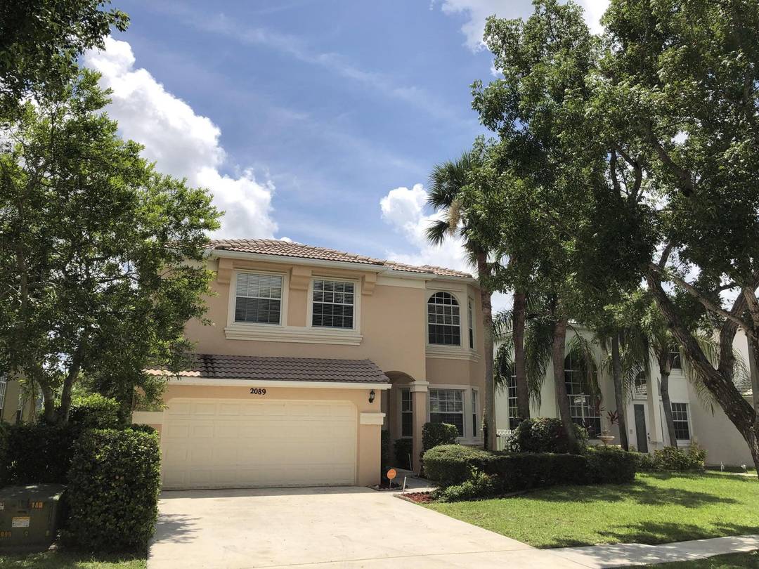 Beautiful two story 5 bedroom home with over 3038 sf overlooking M1 Canal in a gated community of Madison Green.