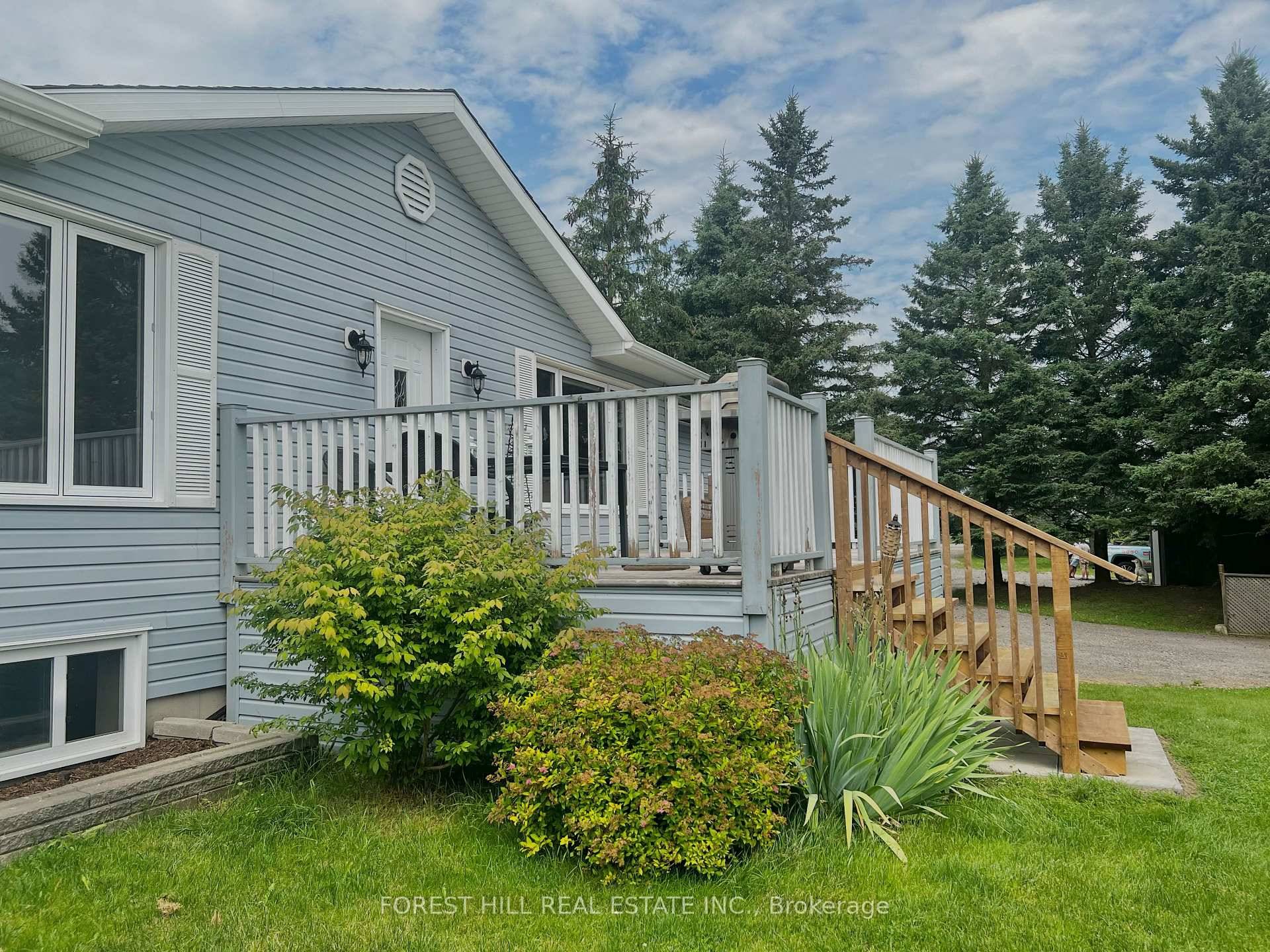 Welcome to 502094 Hwy 89, a move in ready raised bungalow on 3.