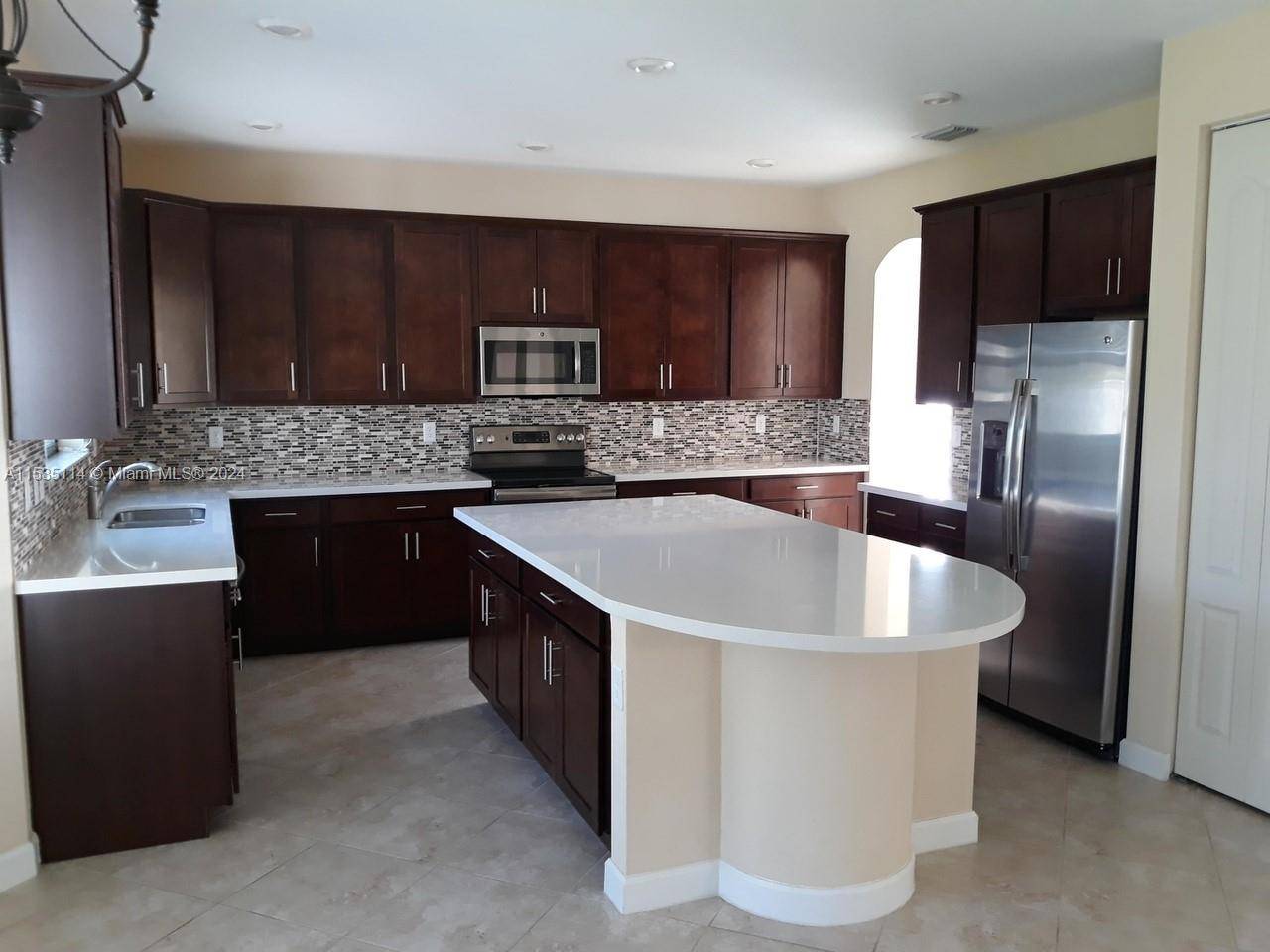 Unwind in this sprawling 4 bedroom, 4 bathroom haven nestled in the prestigious Silverwood Estates of Palm Beach County.