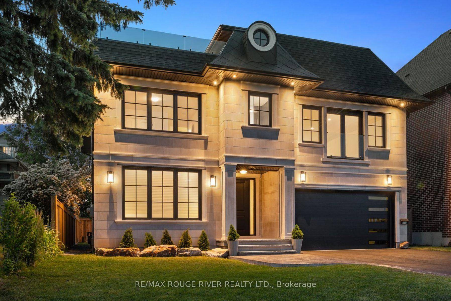 Check out the Video This custom built, 3 storey home plus finished basement with spectacular lake views, was worth the wait !