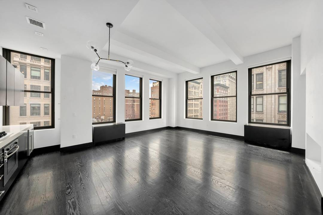BRAND NEW TO MARKET Stunning Loft Style Corner Condo with 11ft Ceilings on Prime Park Avenue South in the Heart of Flatiron This spectacular 2 bedroom, 2.