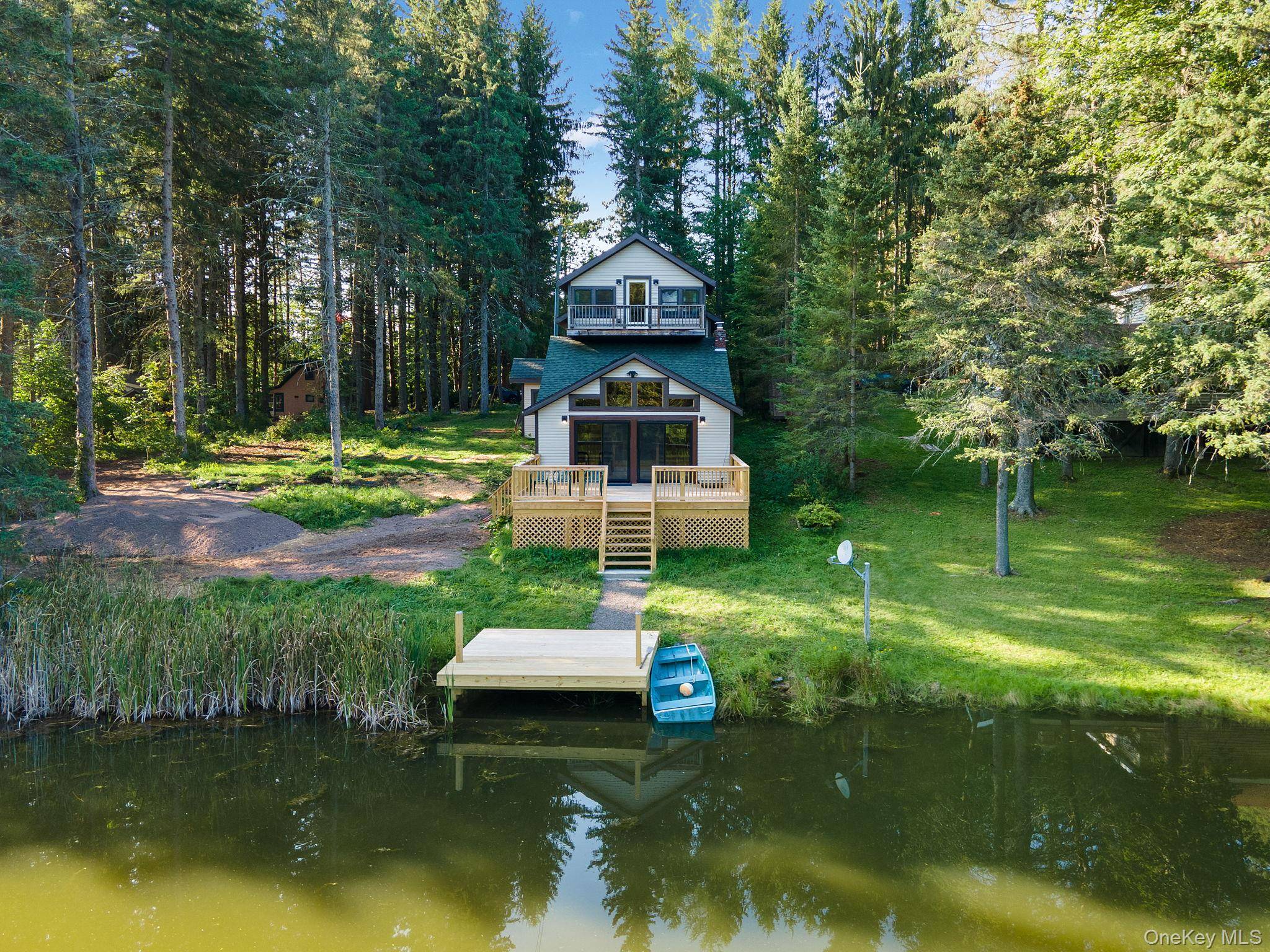 Imagine coming home to this Lake Front Oasis.