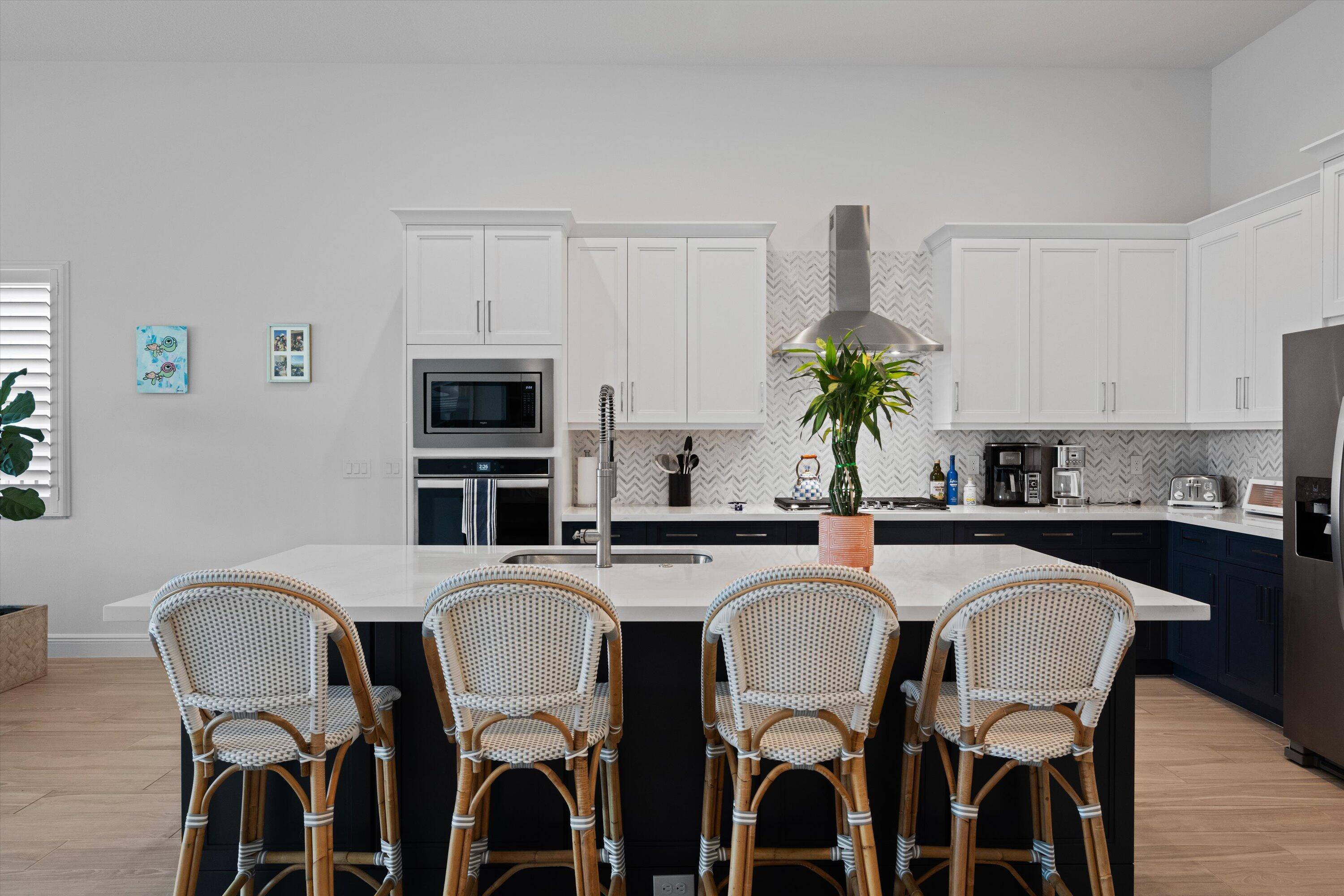 Experience elevated South Florida living in this 2023 built Edmonton model the largest single story floor plan in Windgate at Avenir.