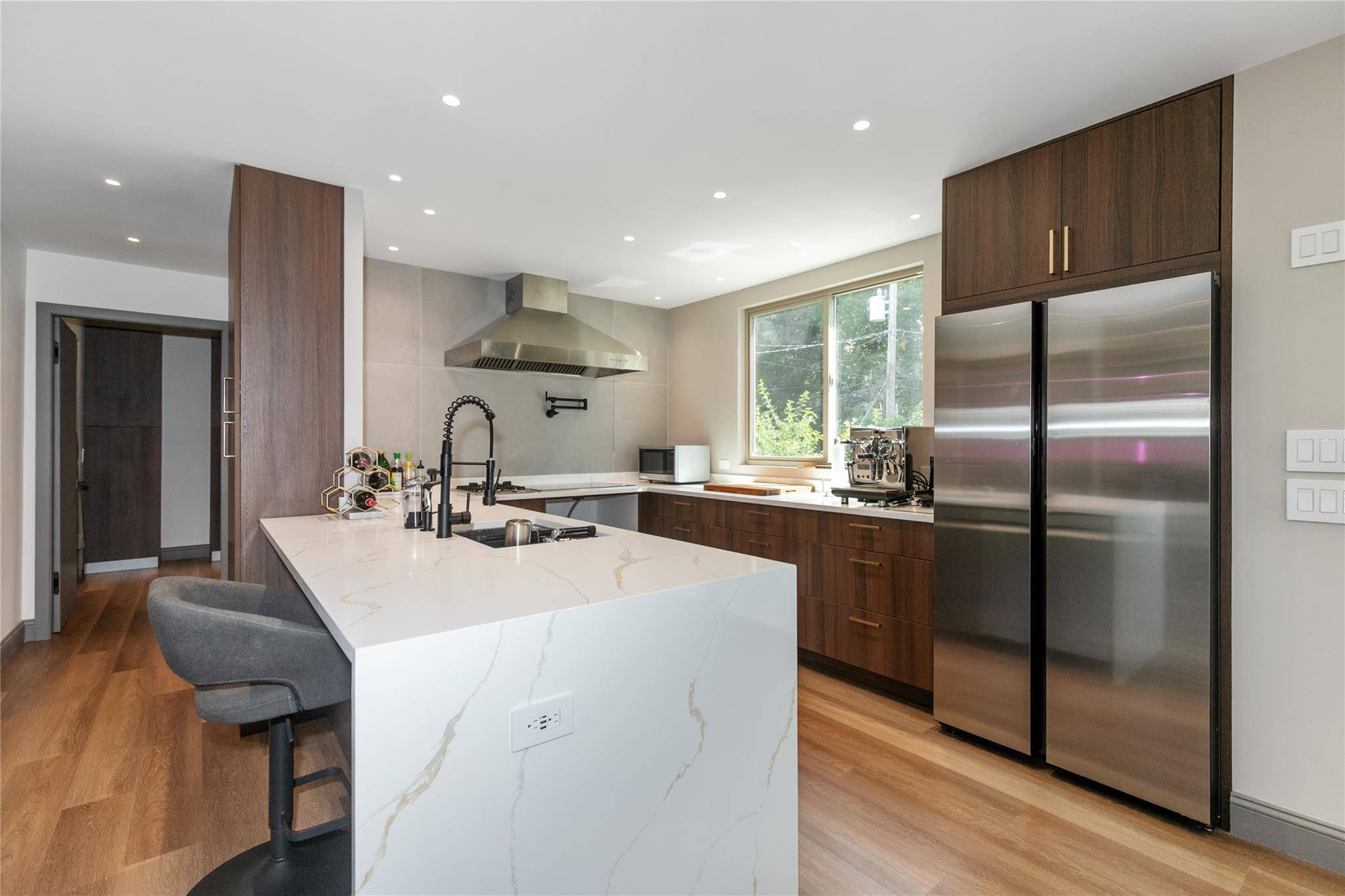 Fully Gut Renovated Cape in the Heart of Albertson Welcome to this beautifully renovated Cape, ideally located on a quiet, tree lined street in the heart of Albertson.
