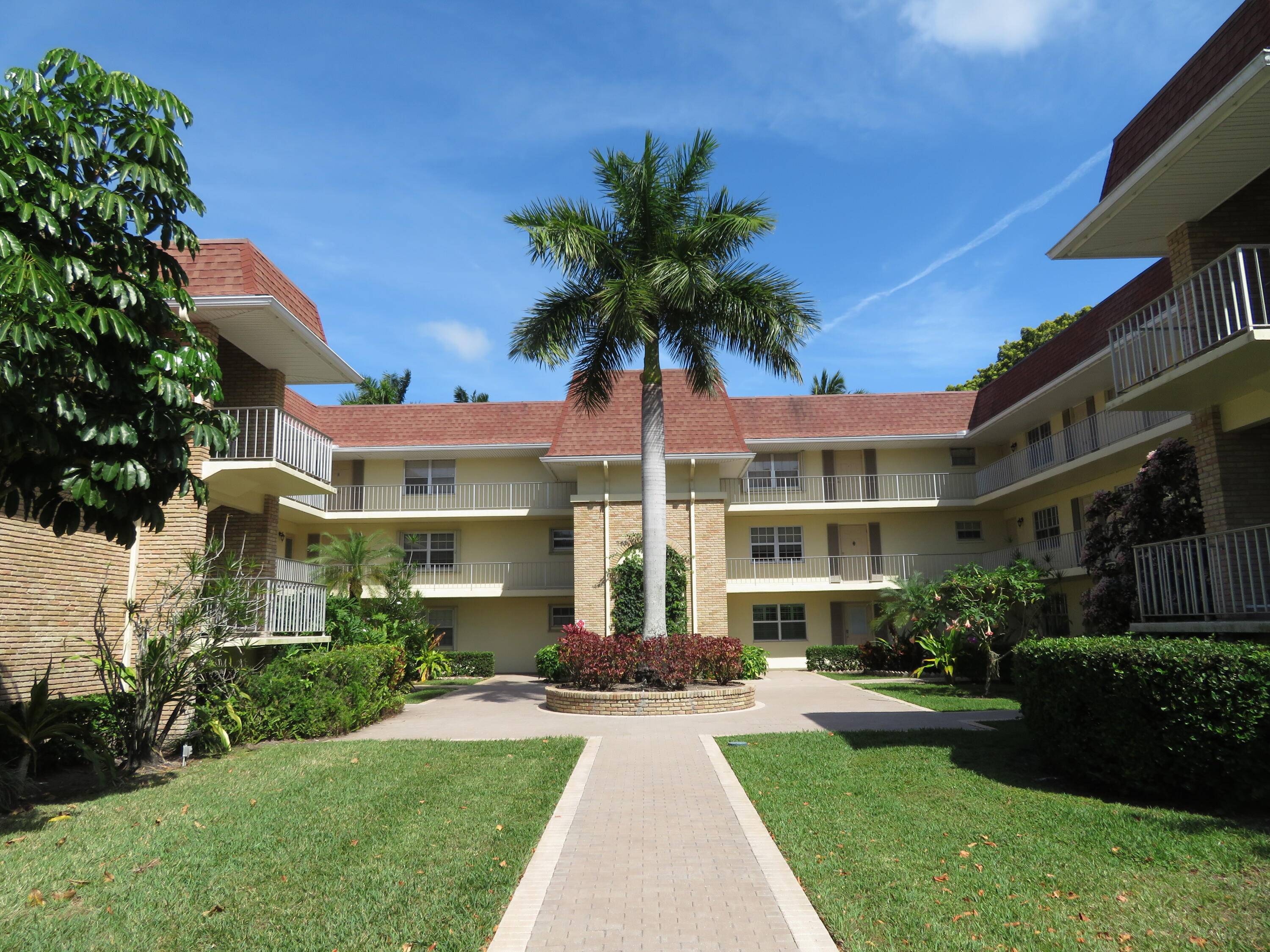 Welcome to 5580 Tamberlane 334, a charming corner unit in the heart of Palm Beach Gardens.