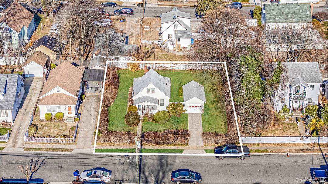 Opportunity awaits with this 2 bed, 1 bath bungalow situated on a generous 8, 000 sq ft property in Uniondale.