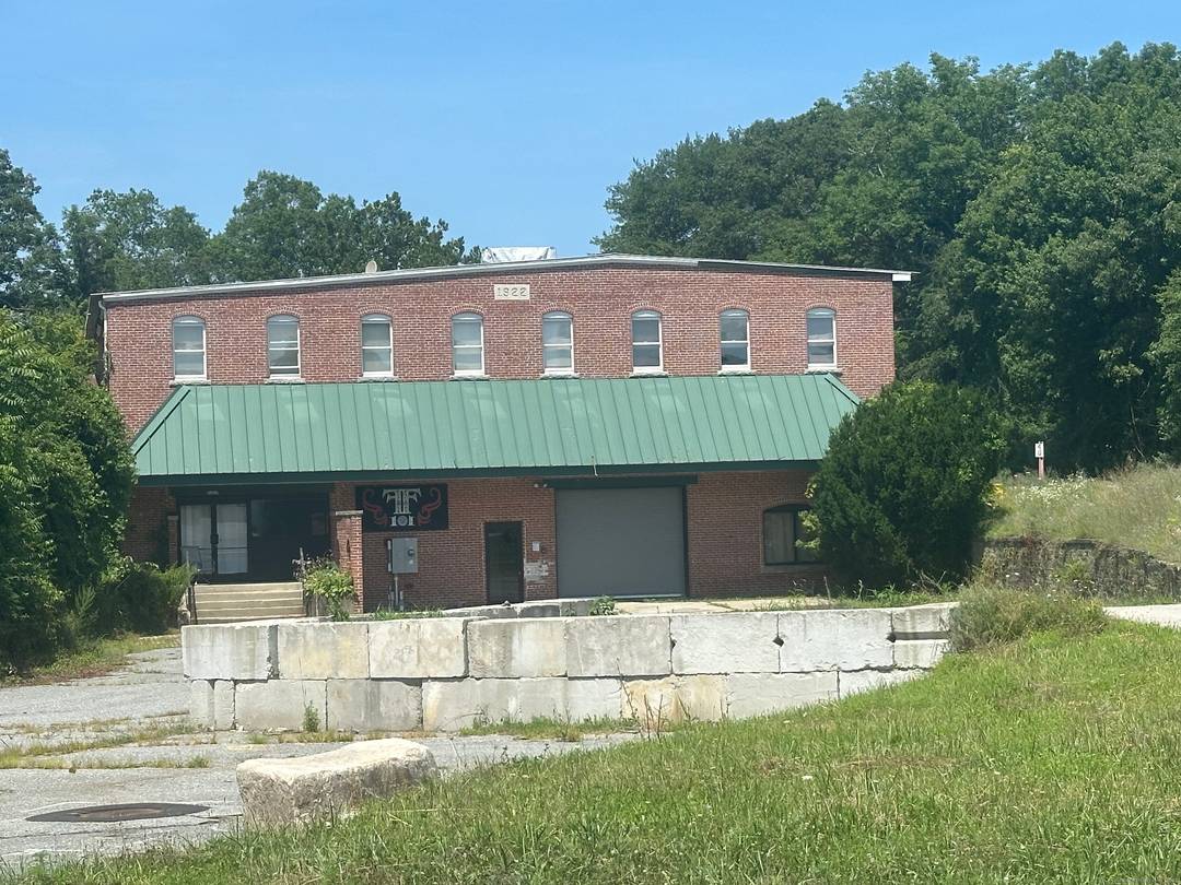 Step into the past while embracing the future with this captivating brick commercial building, nestled in a prime location with mixed use zoning.