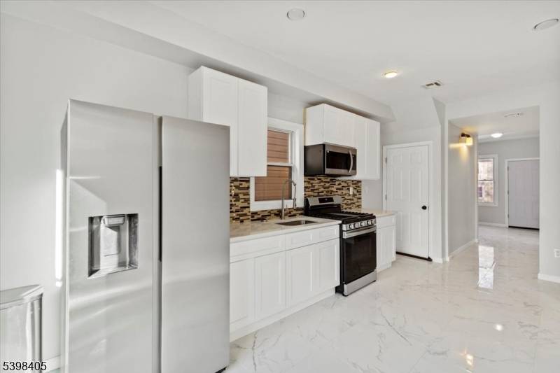 Your 4 Bedroom Home with Room to Grow 858 Lyons Ave, Irvington.